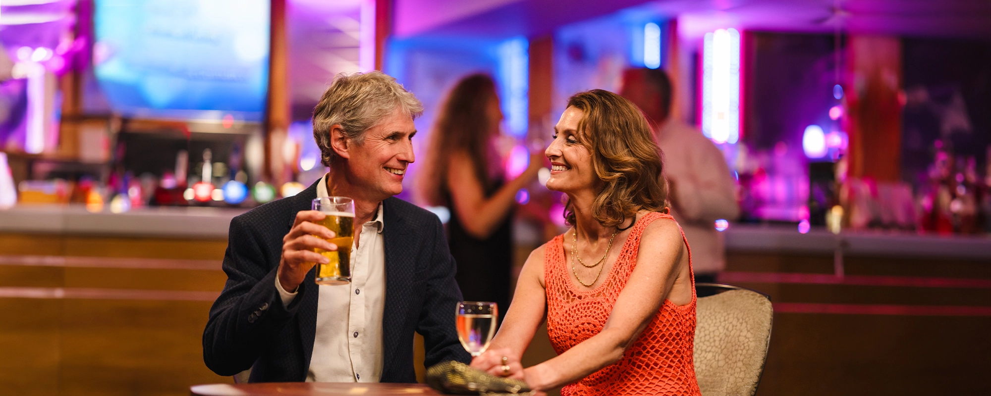 Love Potters Resorts couple enjoying a drink and smiling